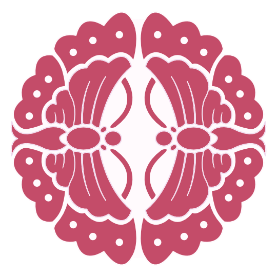 赤く色を塗った向蝶丸文様